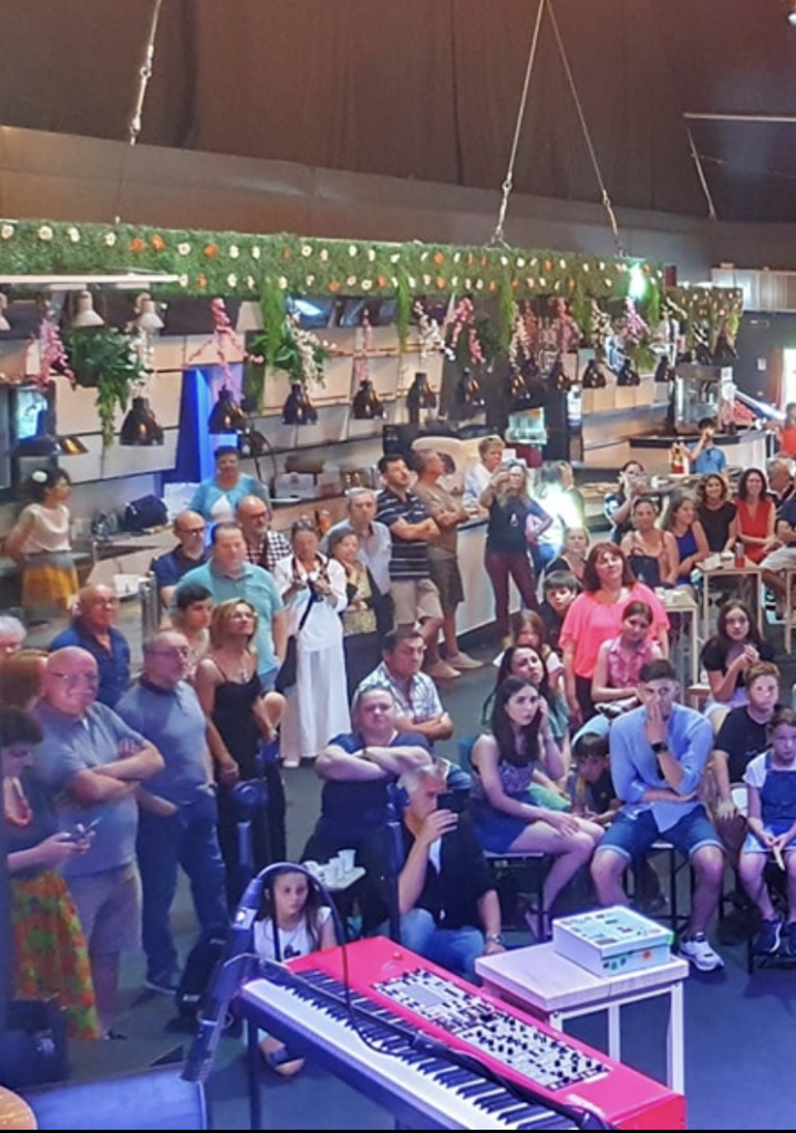 People on the live show event of absolute music school